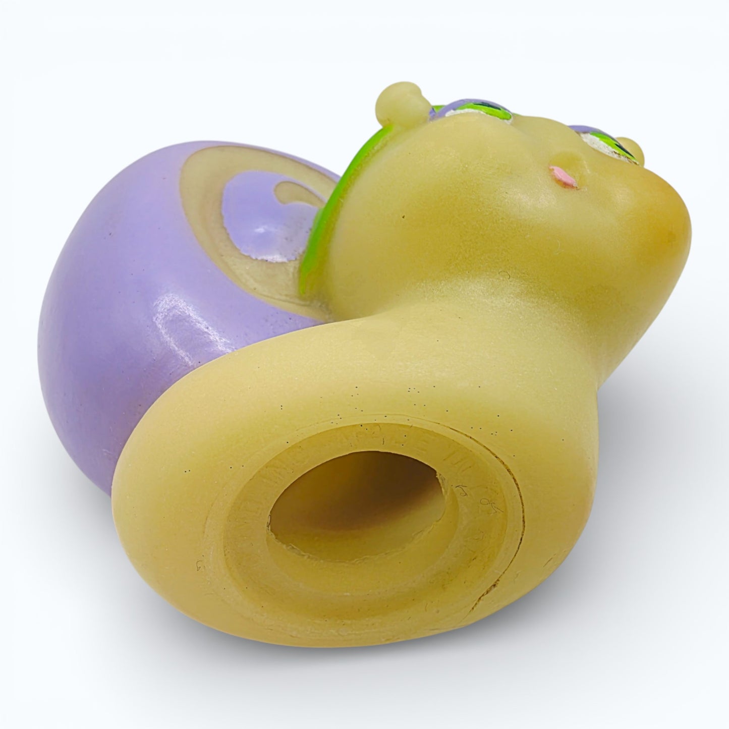 Vintage 1980s mini pvc figure. Glo Snail. 3". Bottom view.