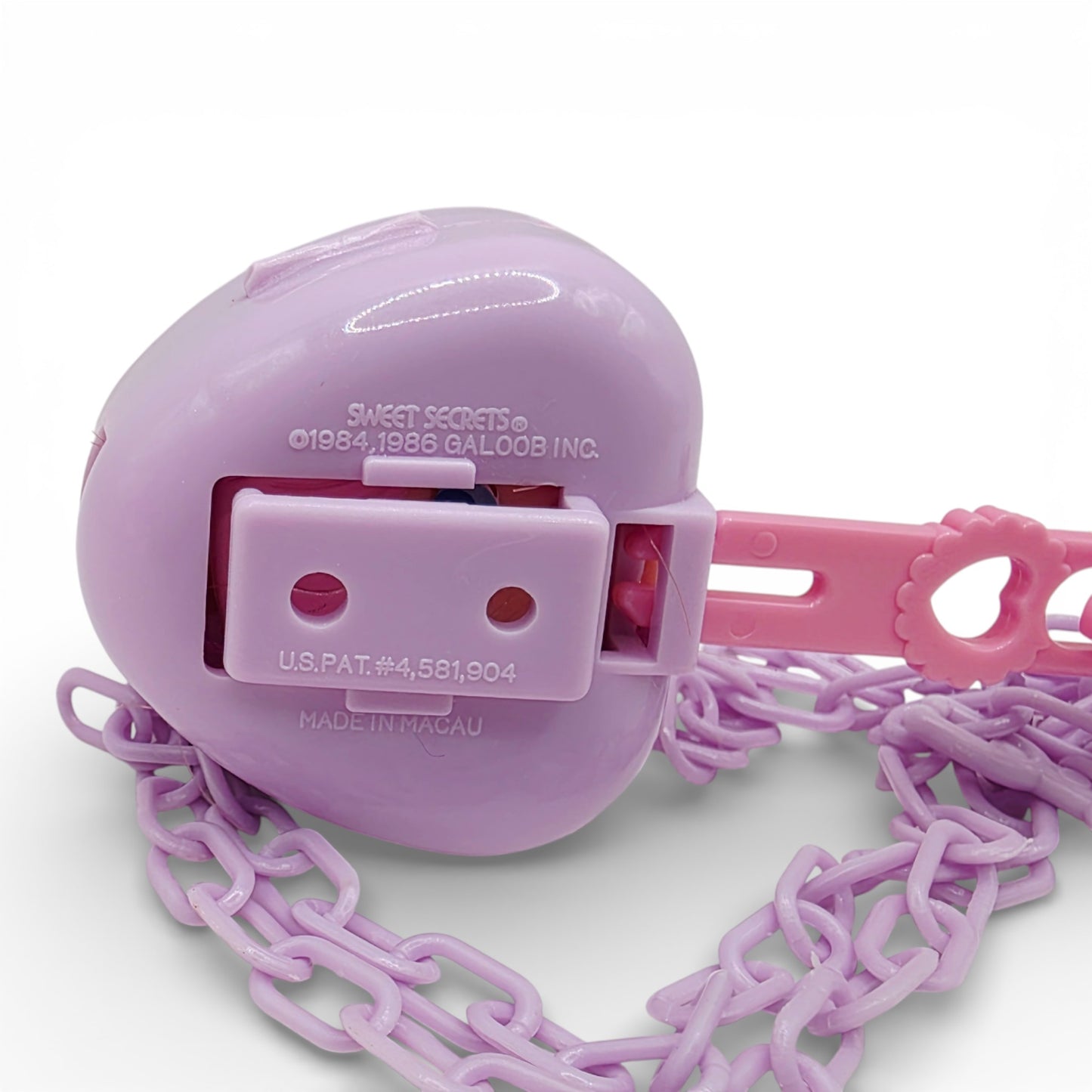 Vintage 1980s small toy. Series 3. Curli Heart. Complete with Necklace Clip!. Close up 1 view.