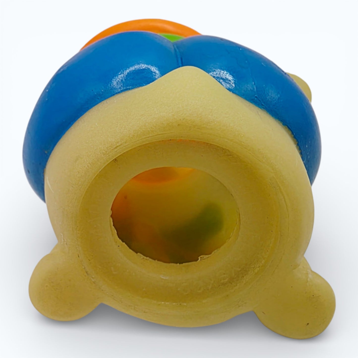 Vintage 1980s mini pvc figure. Glo Bookbug. 3". Bottom view.