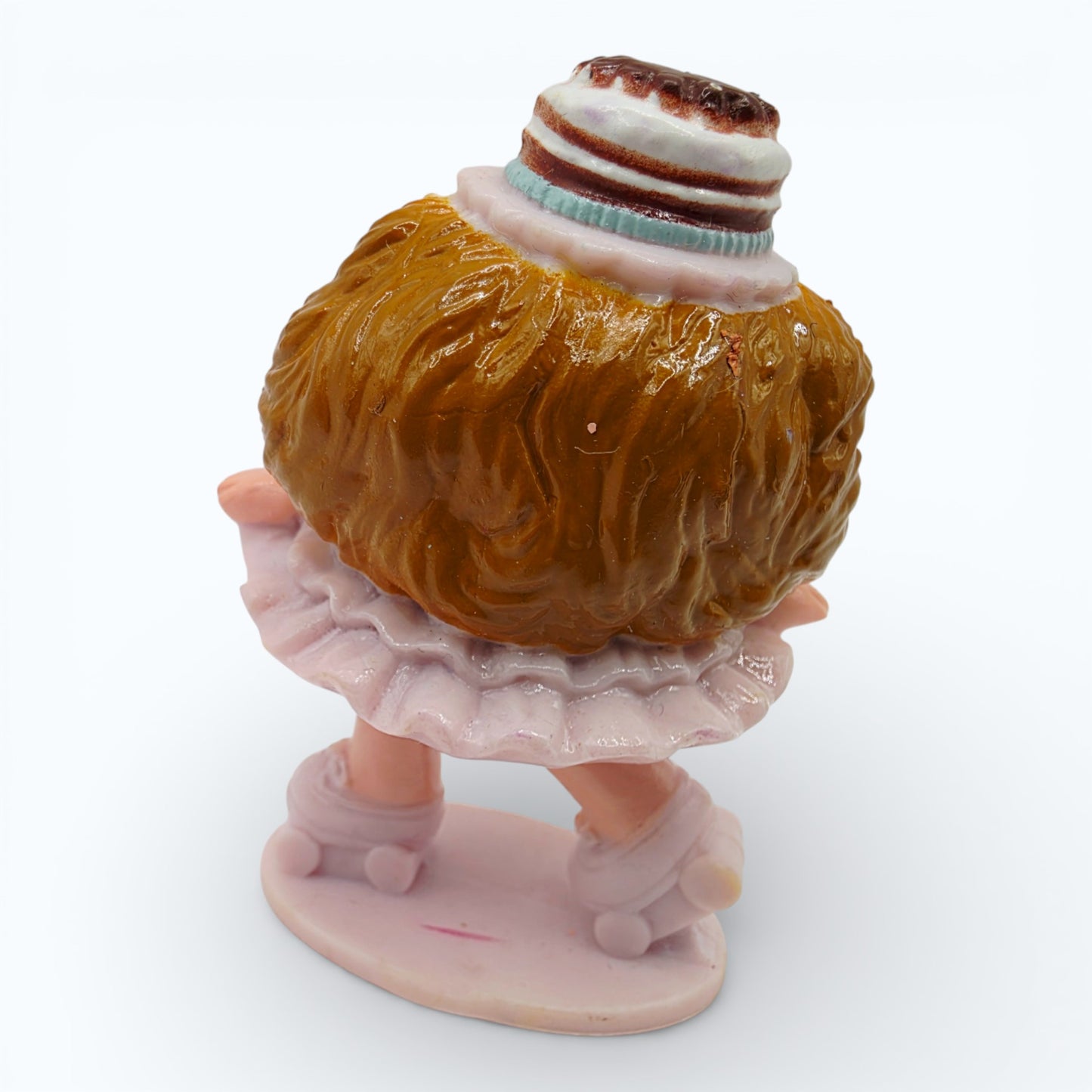 Vintage 1980s mini pvc figure. Series 2 Miniatures. Chocolottie. 2.5". Back view.