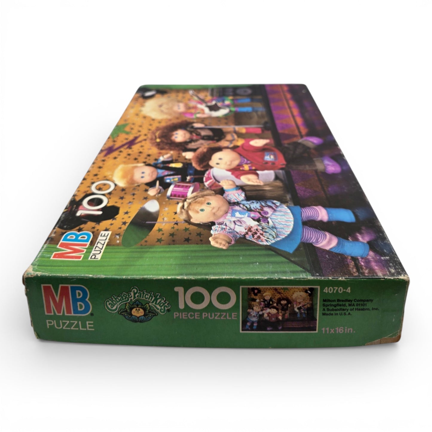 Vintage 1990s puzzles & jigsaws. 100 piece Puzzle. CPK Rocking Out. Close up 1 view.