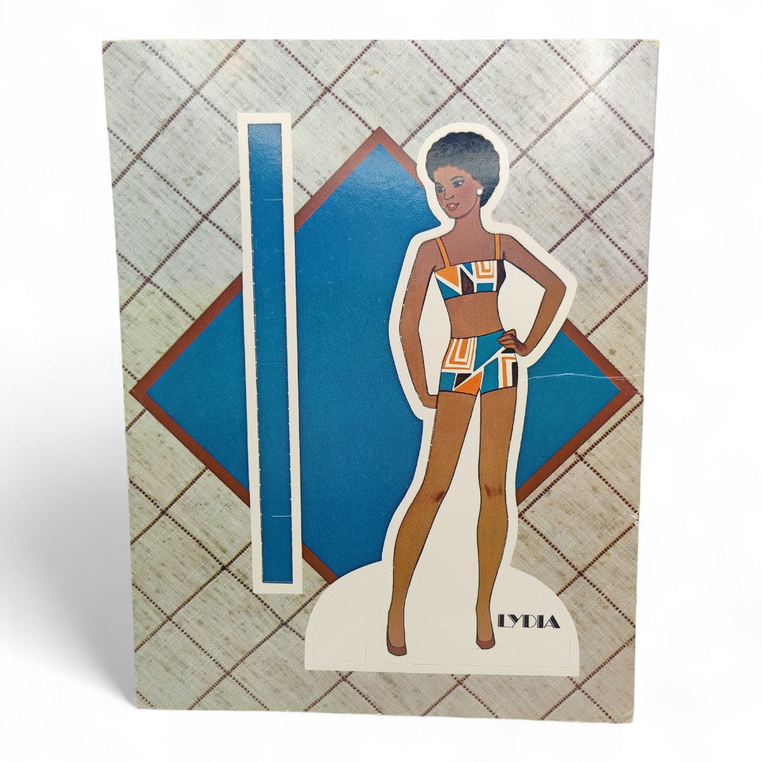 Vintage 1970s paper doll book. Vintage Paper Doll Book. Back view.
