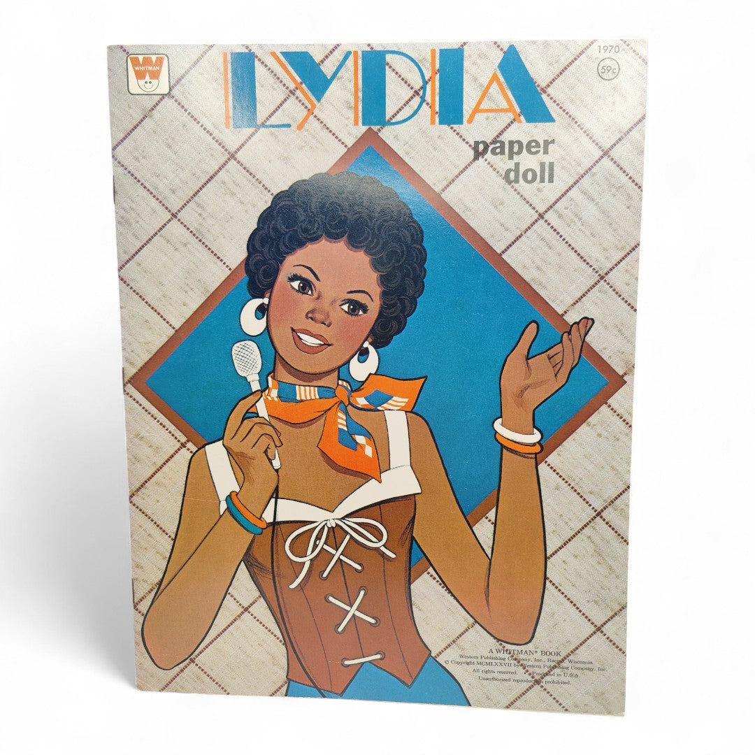 Vintage 1970s paper doll book. Vintage Paper Doll Book. Front view.