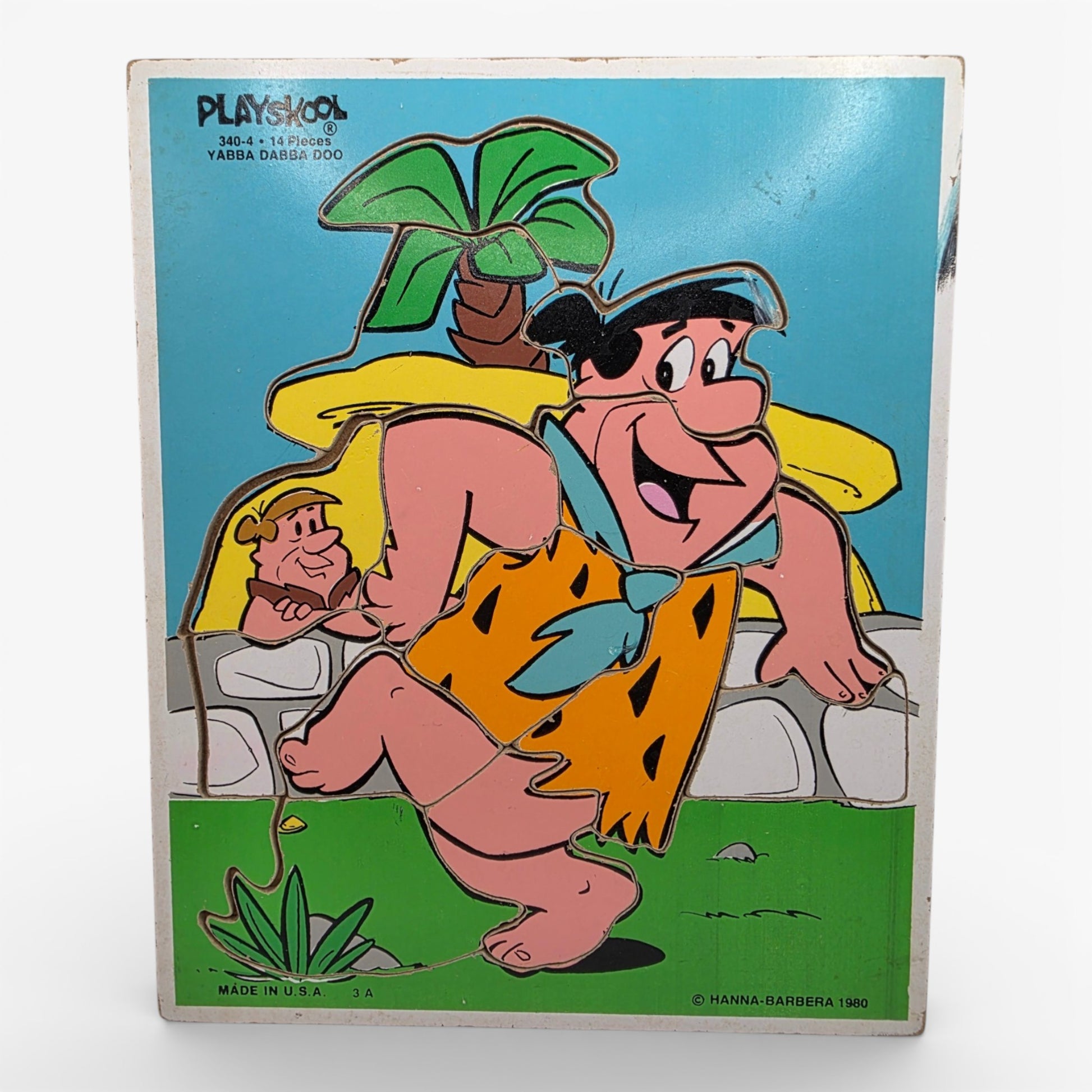 Vintage 1980s puzzles & jigsaws. Wooden Puzzle. Fred & Barney. Front view.