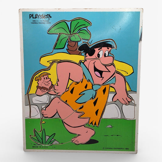 Vintage 1980s puzzles & jigsaws. Wooden Puzzle. Fred & Barney. Front view.