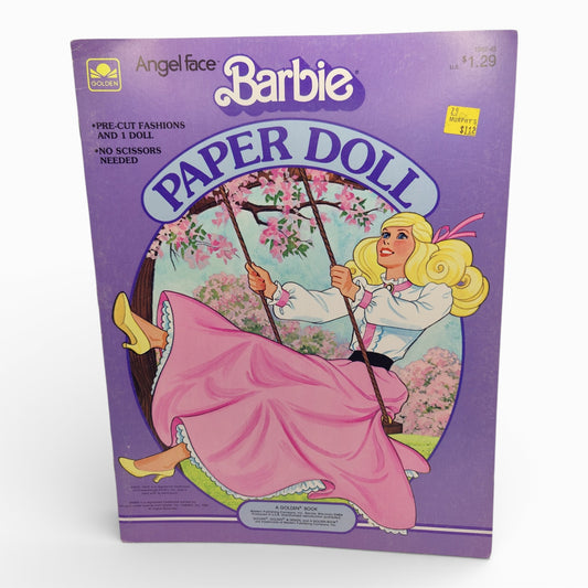 Vintage 1980s paper doll book. Vintage Paper Doll Book. Angel Face. Face view.