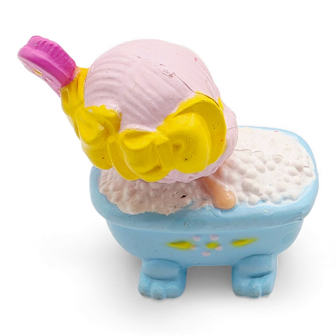 Vintage 1980s mini pvc figure. Strawberryland Miniatures. Angel Cake. In the bathtub 2". Back view.