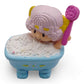 Vintage 1980s mini pvc figure. Strawberryland Miniatures. Angel Cake. In the bathtub 2". Front view.