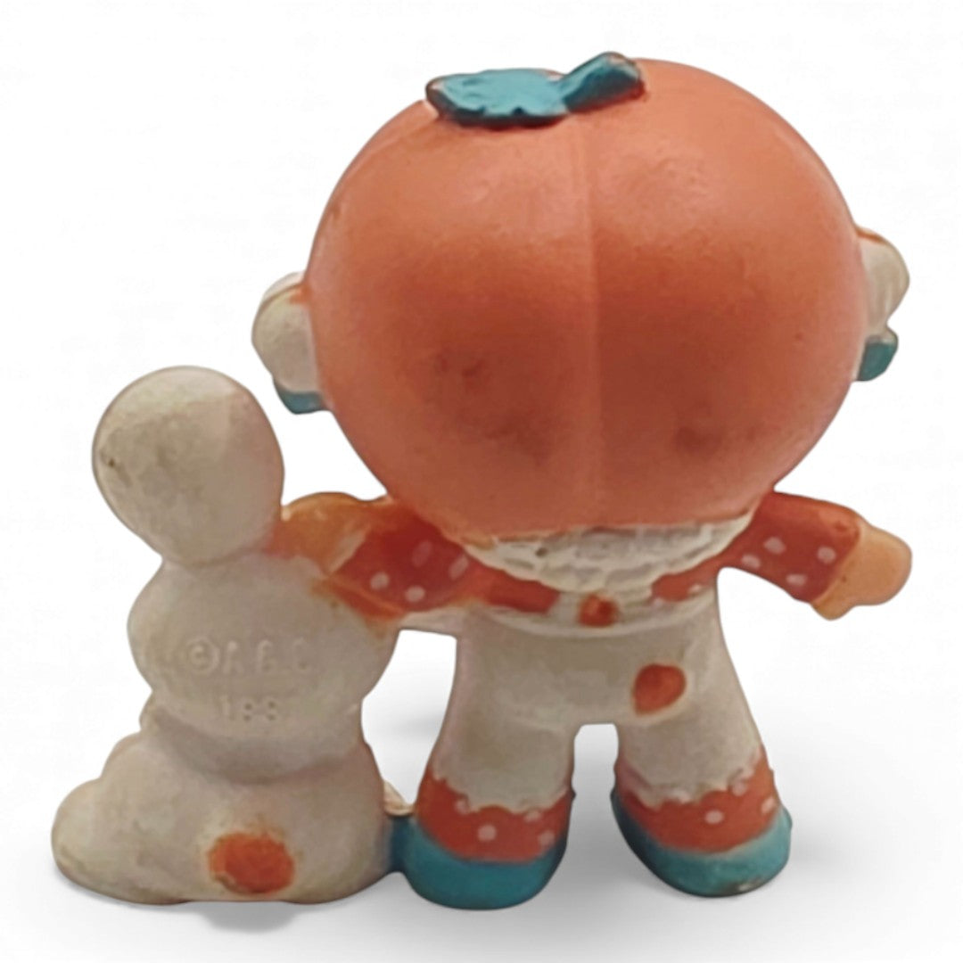 Vintage 1980s mini pvc figure. Strawberryland Miniatures. Apricot. With Hopsalot 2". Back view.