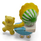 Vintage 1980s mini pvc figure. Strawberryland Miniatures. Butter Cookie. Jelly Bear in Stroller 2". Back view.