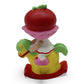 Vintage 1980s mini pvc figure. Strawberryland Miniatures. Cherry Cuddler. On Rocking Horse 2". Back view.