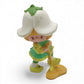 Vintage 1980s mini pvc figure. Strawberryland Miniatures. Mint Tulip. With Shovel 2". Front view.