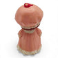 Vintage 1980s mini pvc figure. Strawberryland Miniatures. Strawberry Shortcake. In Nightgown 2". Back view.