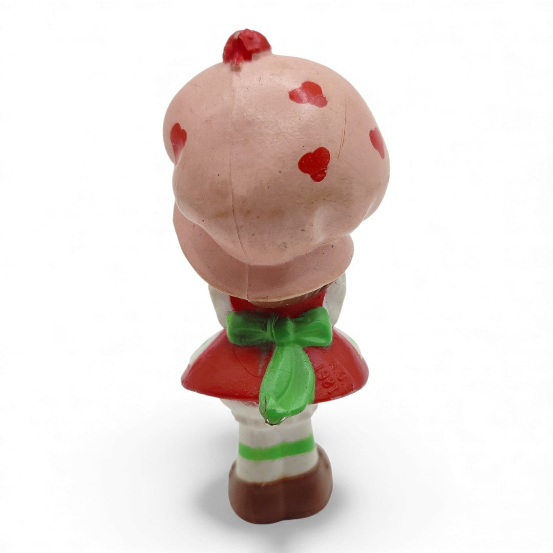 Vintage 1980s mini pvc figure. Strawberryland Miniatures. Strawberry Shortcake. Watering Can 2". Back view.