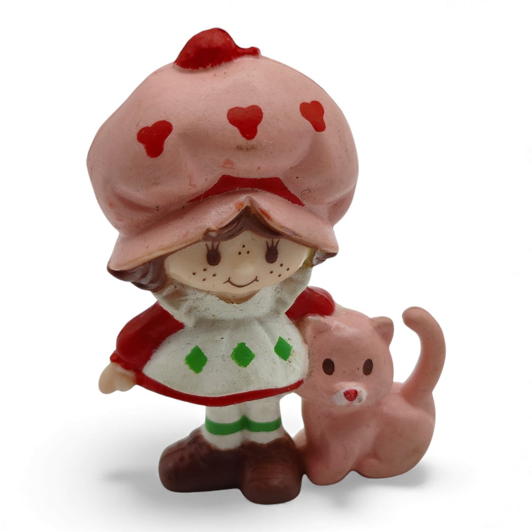 Vintage 1980s mini pvc figure. Strawberryland Miniatures. Strawberry Shortcake. With Custard 2". Front view.