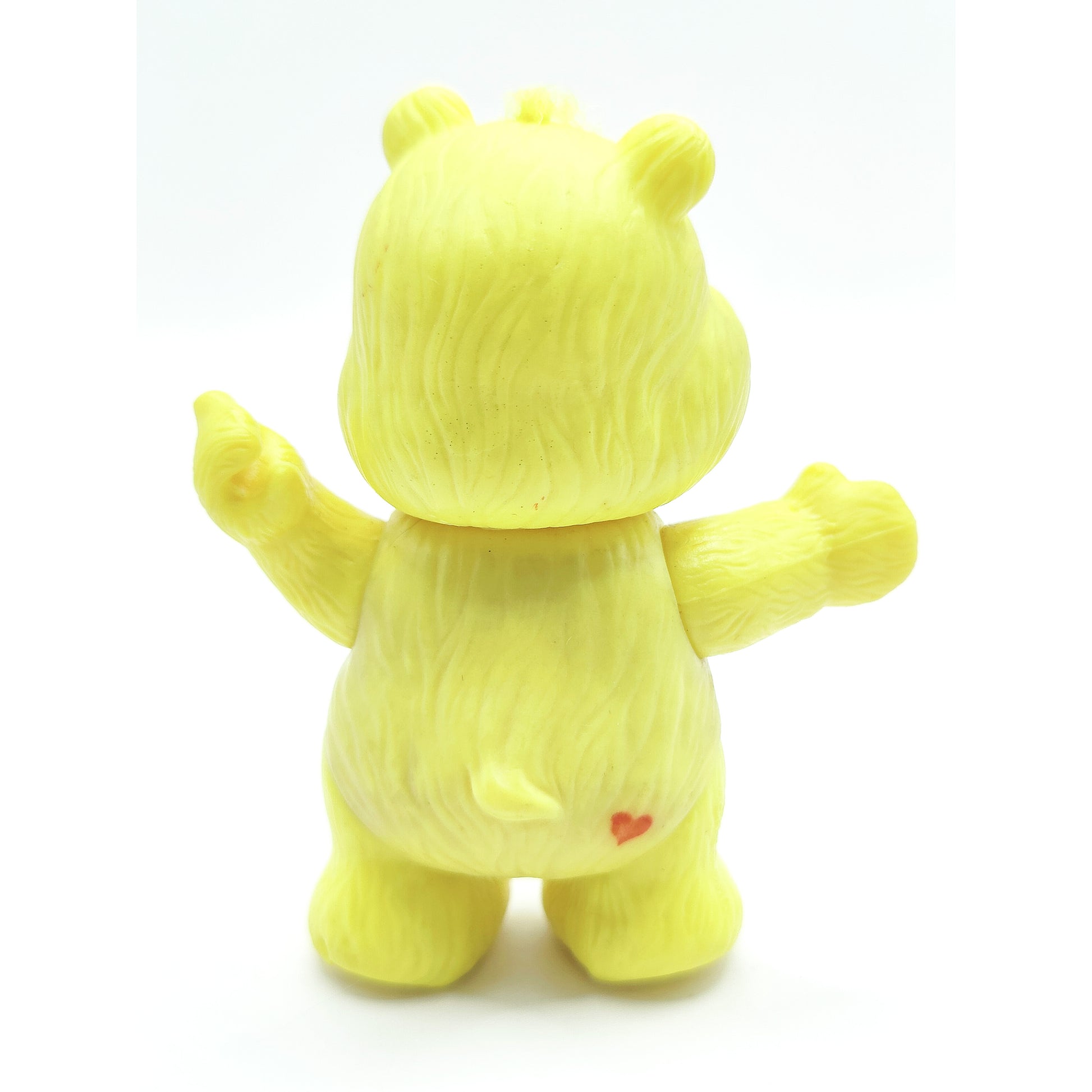Vintage 1980s mini pvc figure. Poseable PVC Figure. Funshine. 3.5". Back view.