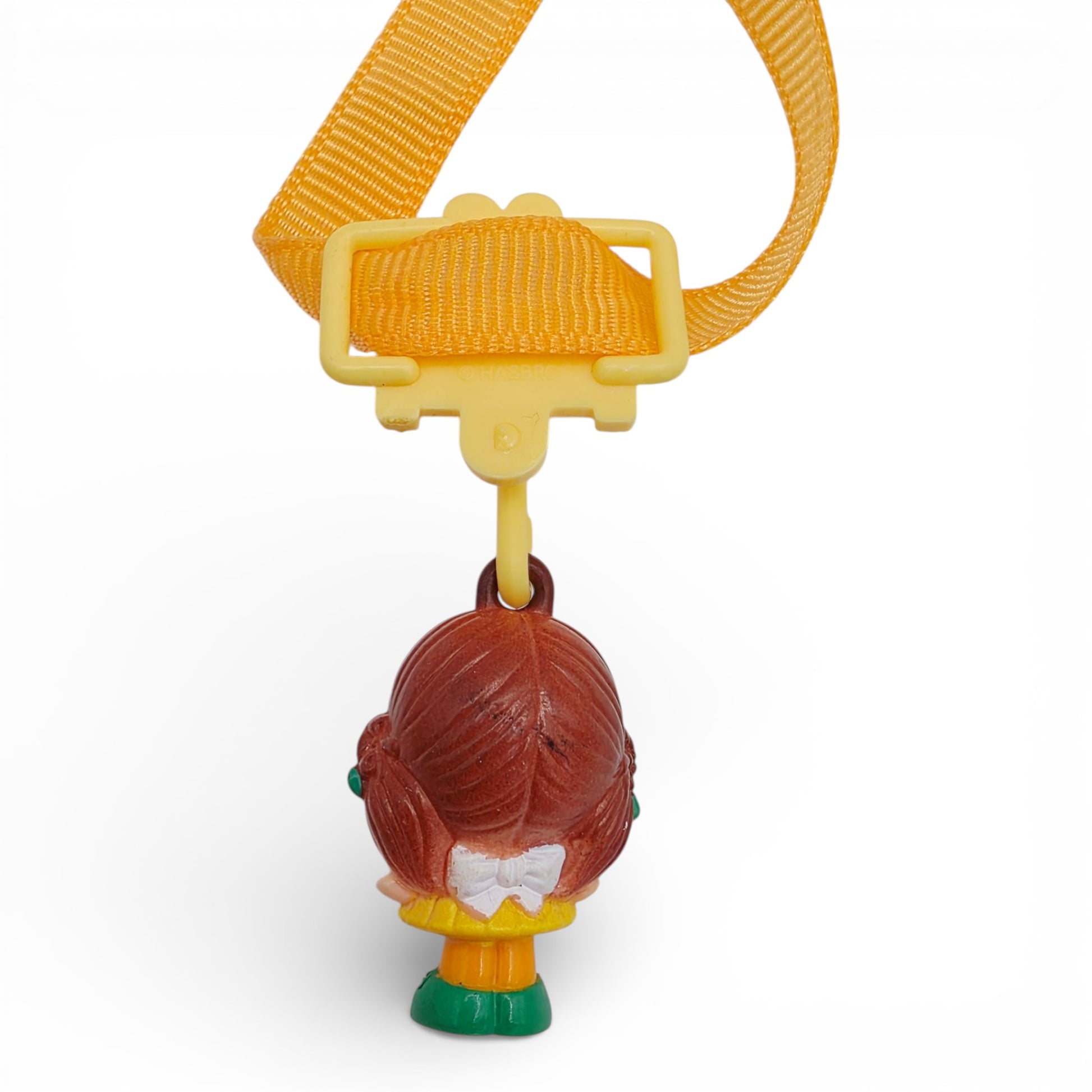 Vintage 1980s small toy. First Release. Brown Eyed Susan. Complete with Original Choker & Ribbon. Back view.