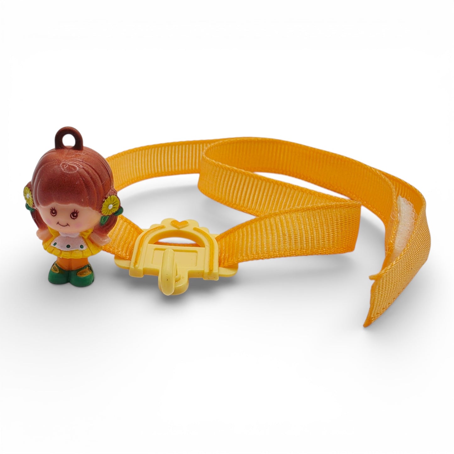 Vintage 1980s small toy. First Release. Brown Eyed Susan. Complete with Original Choker & Ribbon. Close up 2 view.