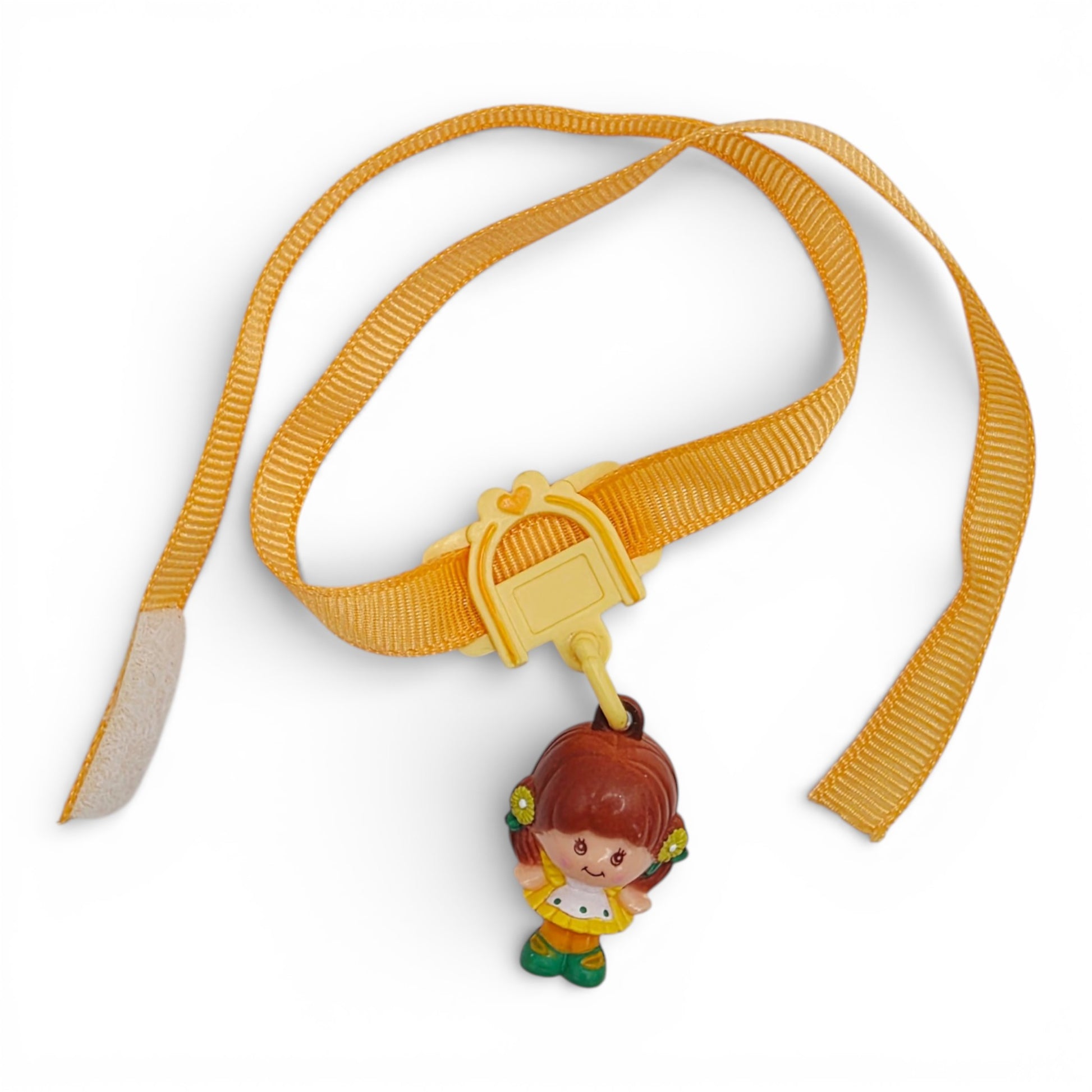 Vintage 1980s small toy. First Release. Brown Eyed Susan. Complete with Original Choker & Ribbon. Front view.