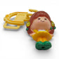 Vintage 1980s small toy. First Release. Brown Eyed Susan. With Original Choker Necklace Clip. Bottom view.