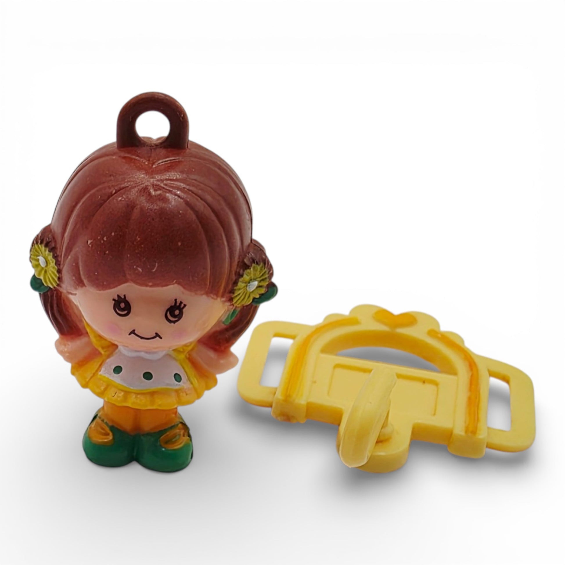 Vintage 1980s small toy. First Release. Brown Eyed Susan. With Original Choker Necklace Clip. Close up 1 view.