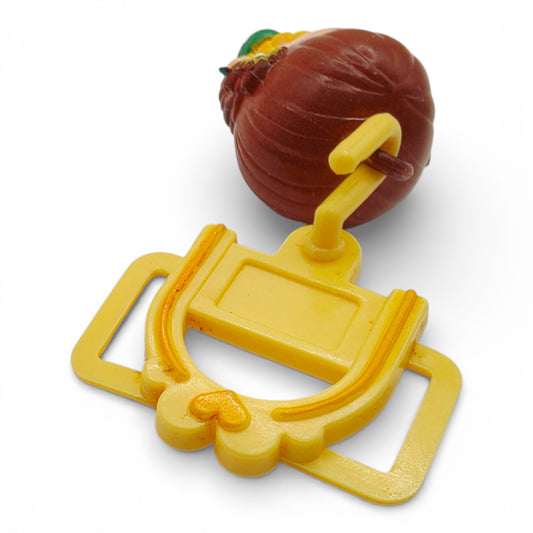 Vintage 1980s small toy. First Release. Brown Eyed Susan. With Original Choker Necklace Clip. Top view.