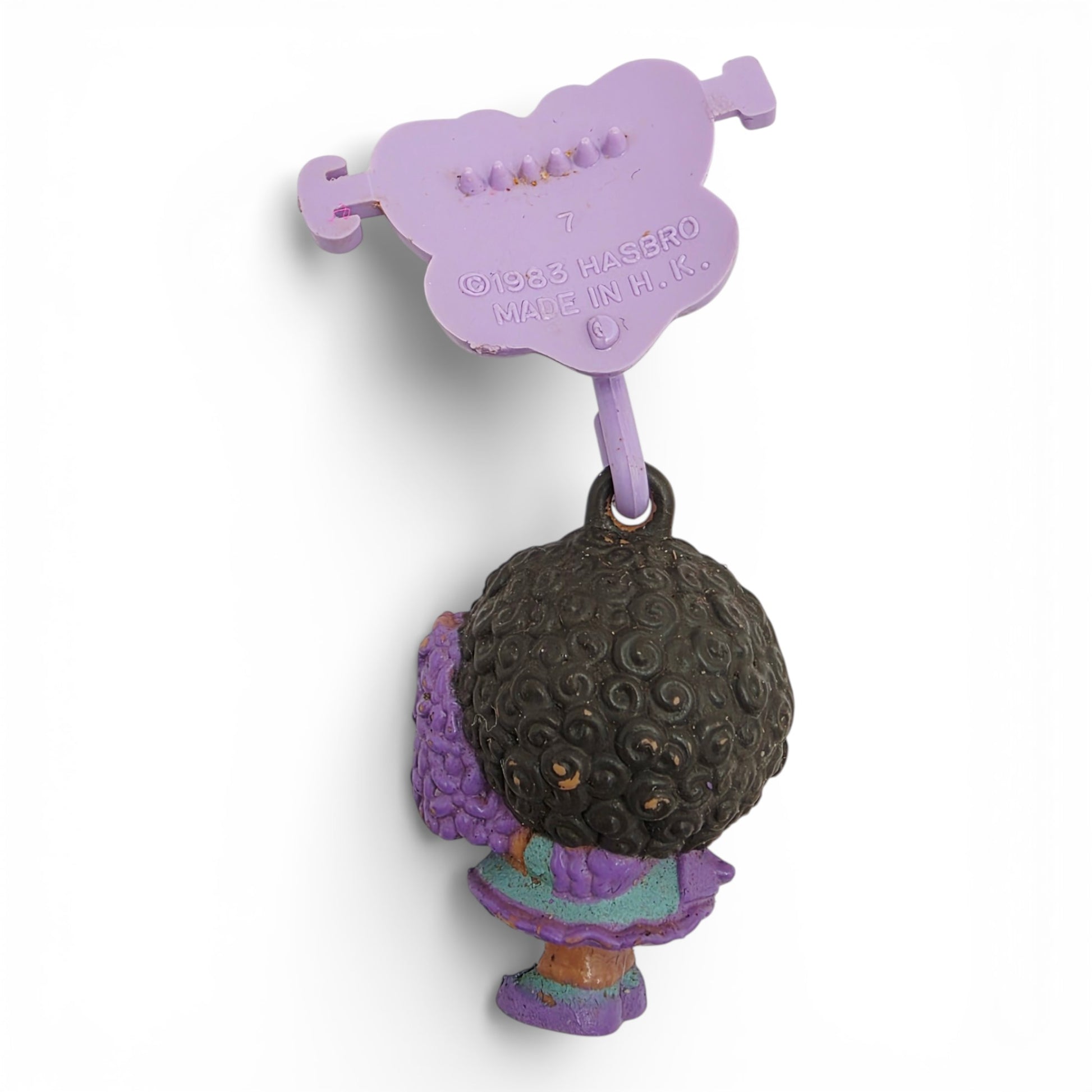 Vintage 1980s small toy. First Release. Hyacinthia. With Original Butterfly Hair Clip & Rare. Back view.
