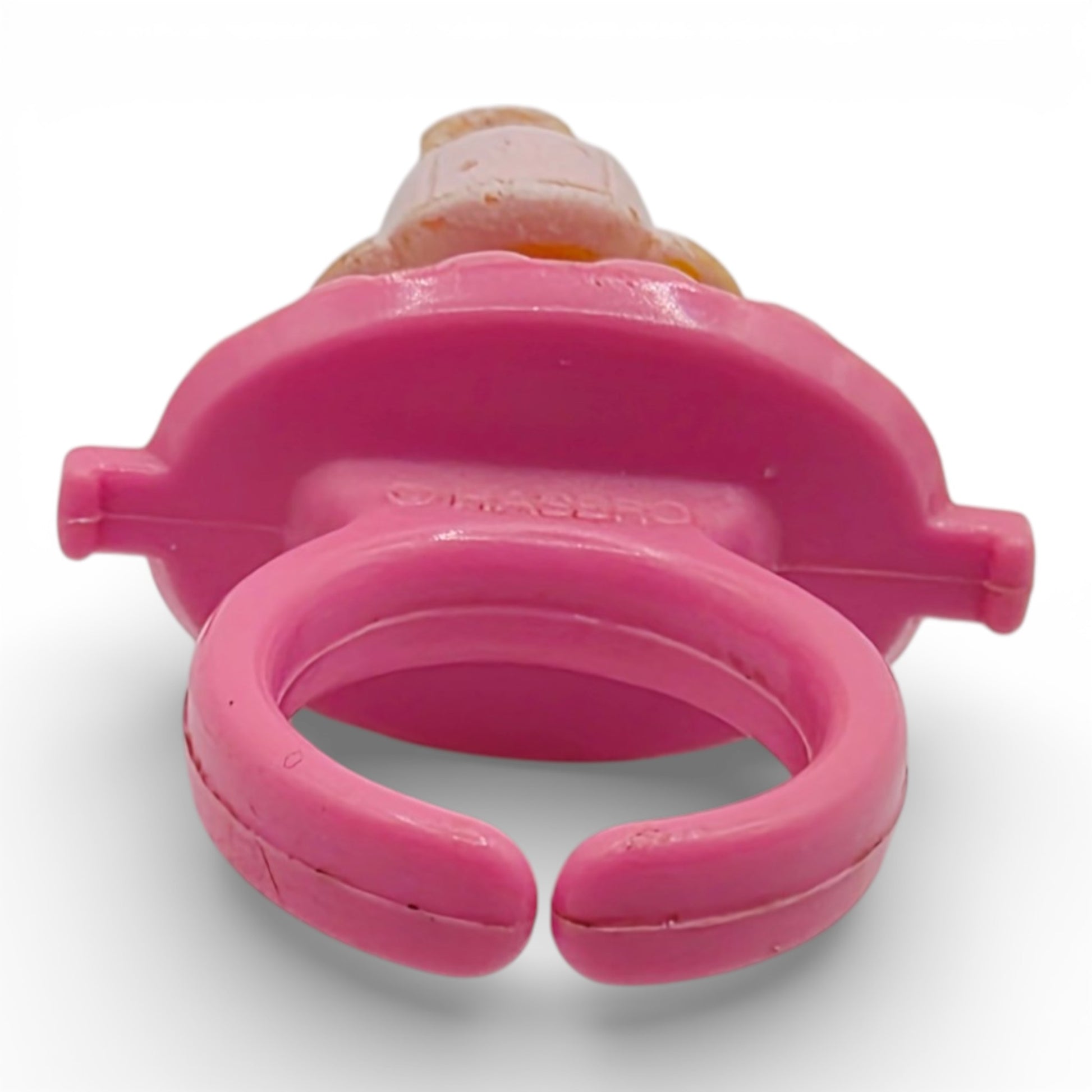 Vintage 1980s small toy. First Release. Lil Tulip. With Original Ring Base. Bottom view.