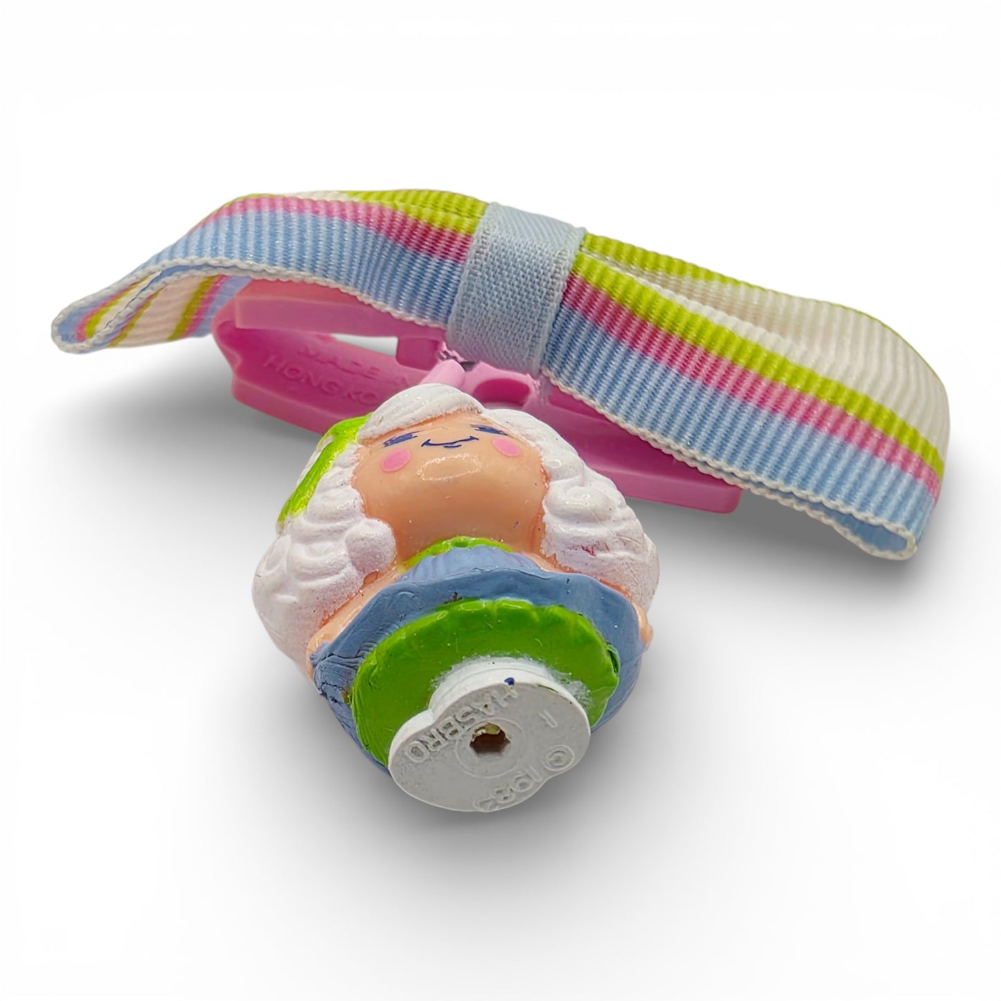Vintage 1980s small toy. First Release. Morning Glory. Complete with Original Striped Bow. Bottom view.