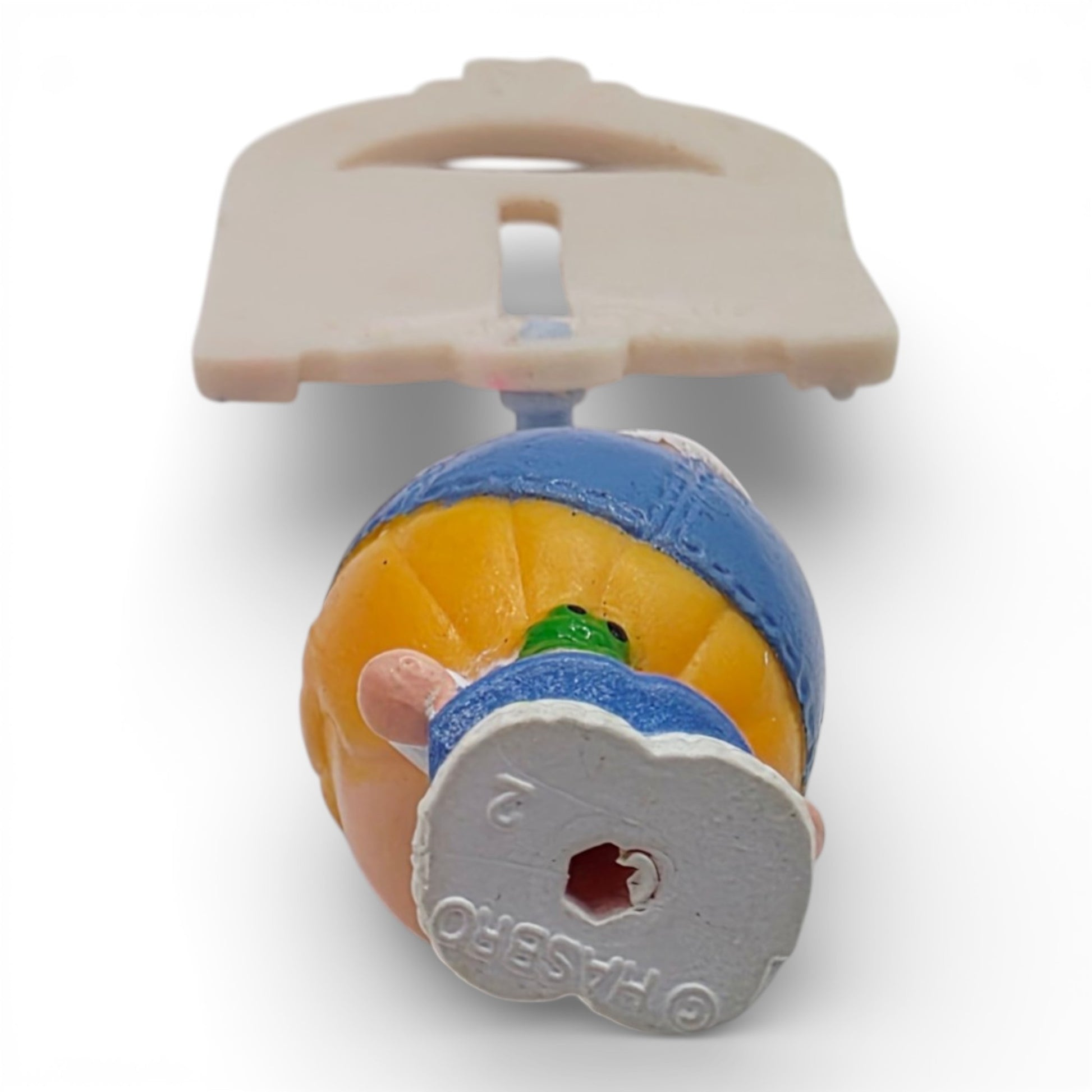 Vintage 1980s small toy. First Release. Willie Winkle. Complete with Original Button Clip. Bottom view.
