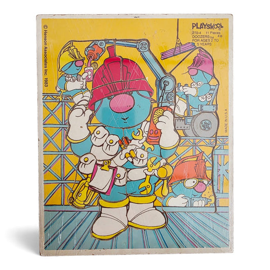 Vintage 1980s puzzles & jigsaws. Wooden Puzzle. Doozers. Front view.