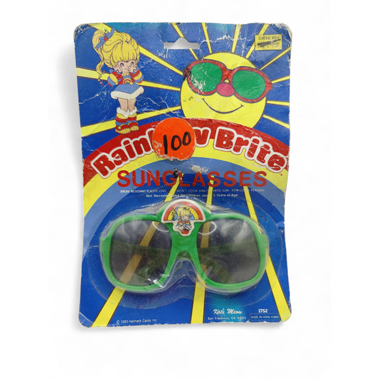 Vintage 1980s small toy. Sunglasses. Face view.