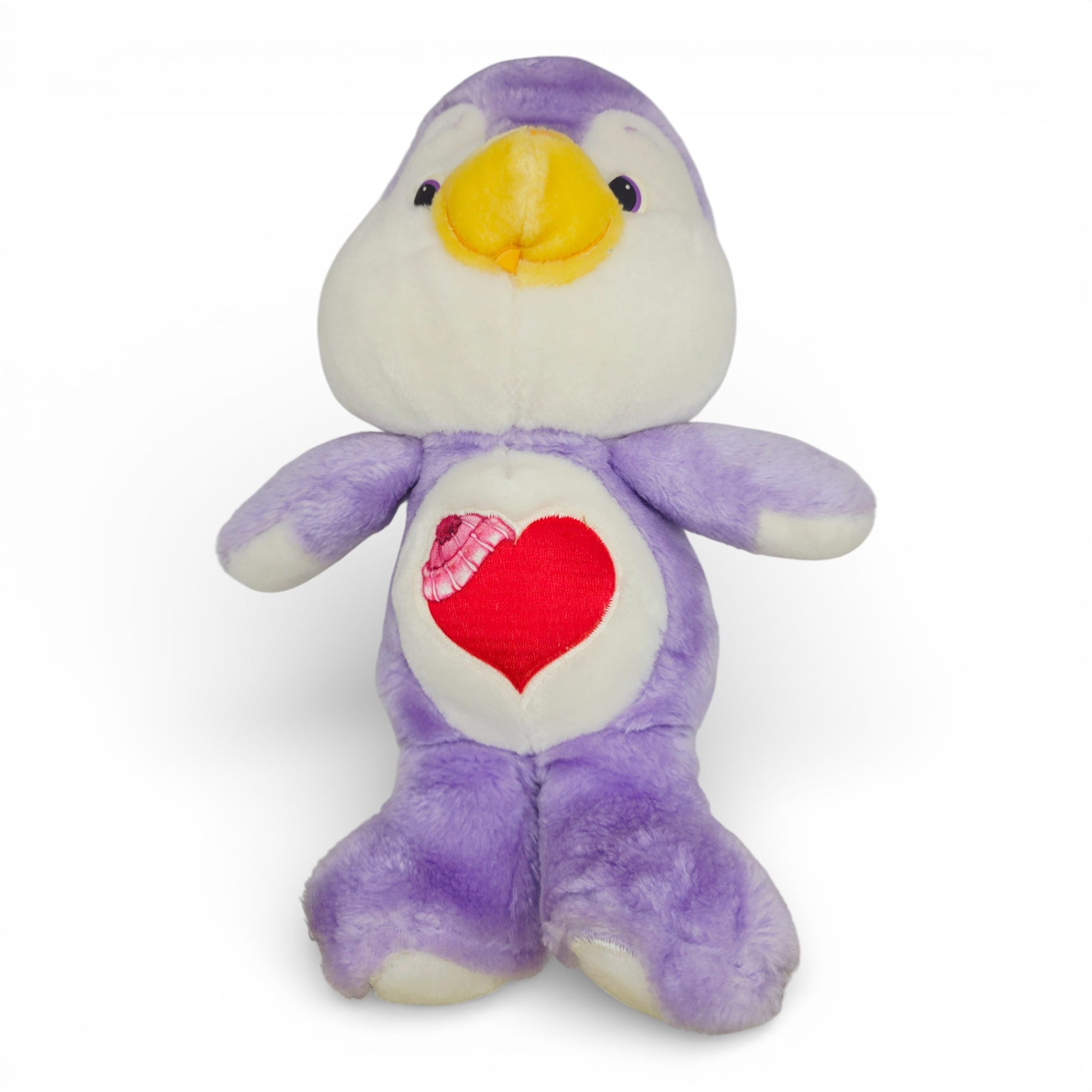 Vintage 1980s plush. Cozy Heart Penguin. 36cm Plush. Close up 1 view.