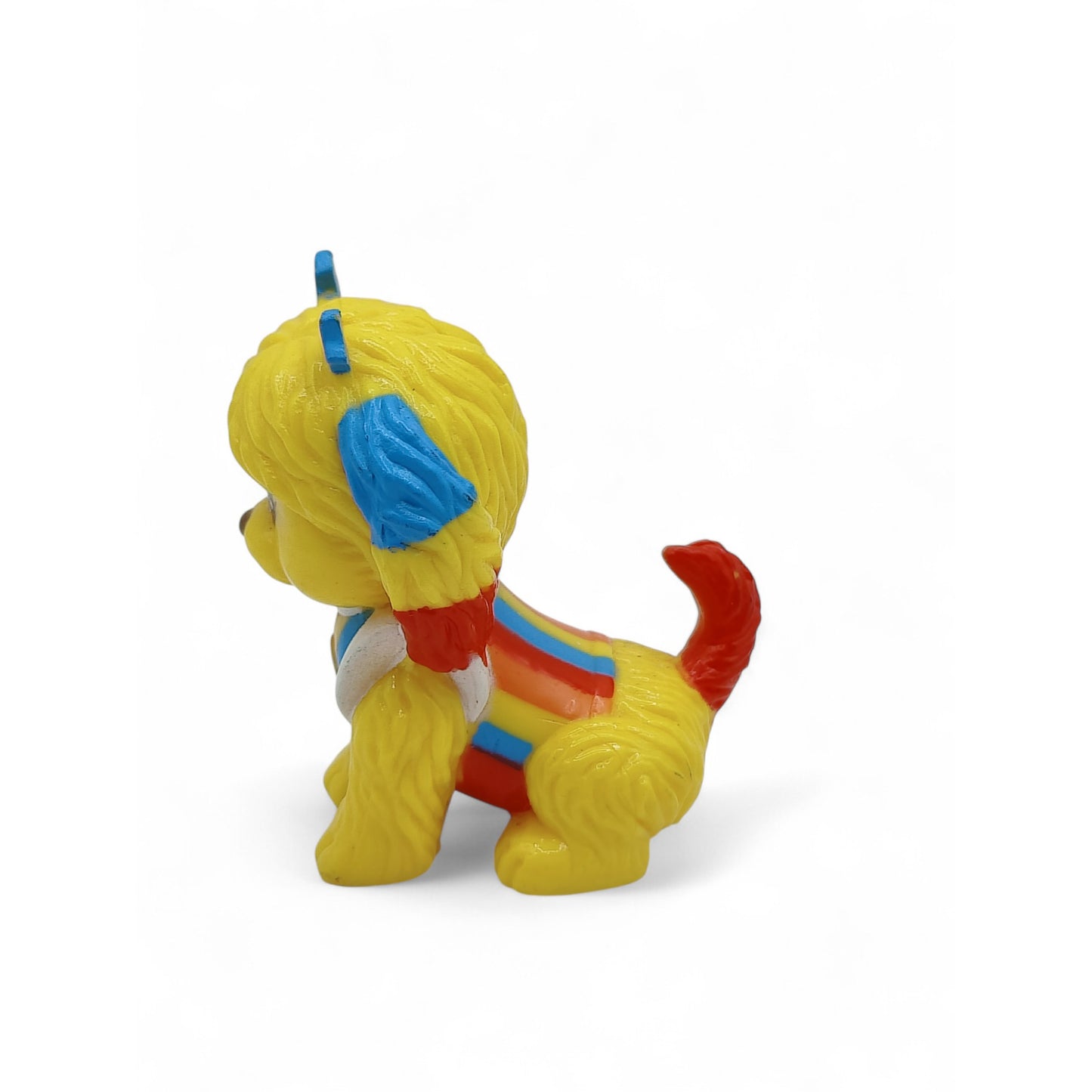 Vintage 1980s mini pvc figure. Mini PVC Figure. Puppy Brite. 6cm. Left view.