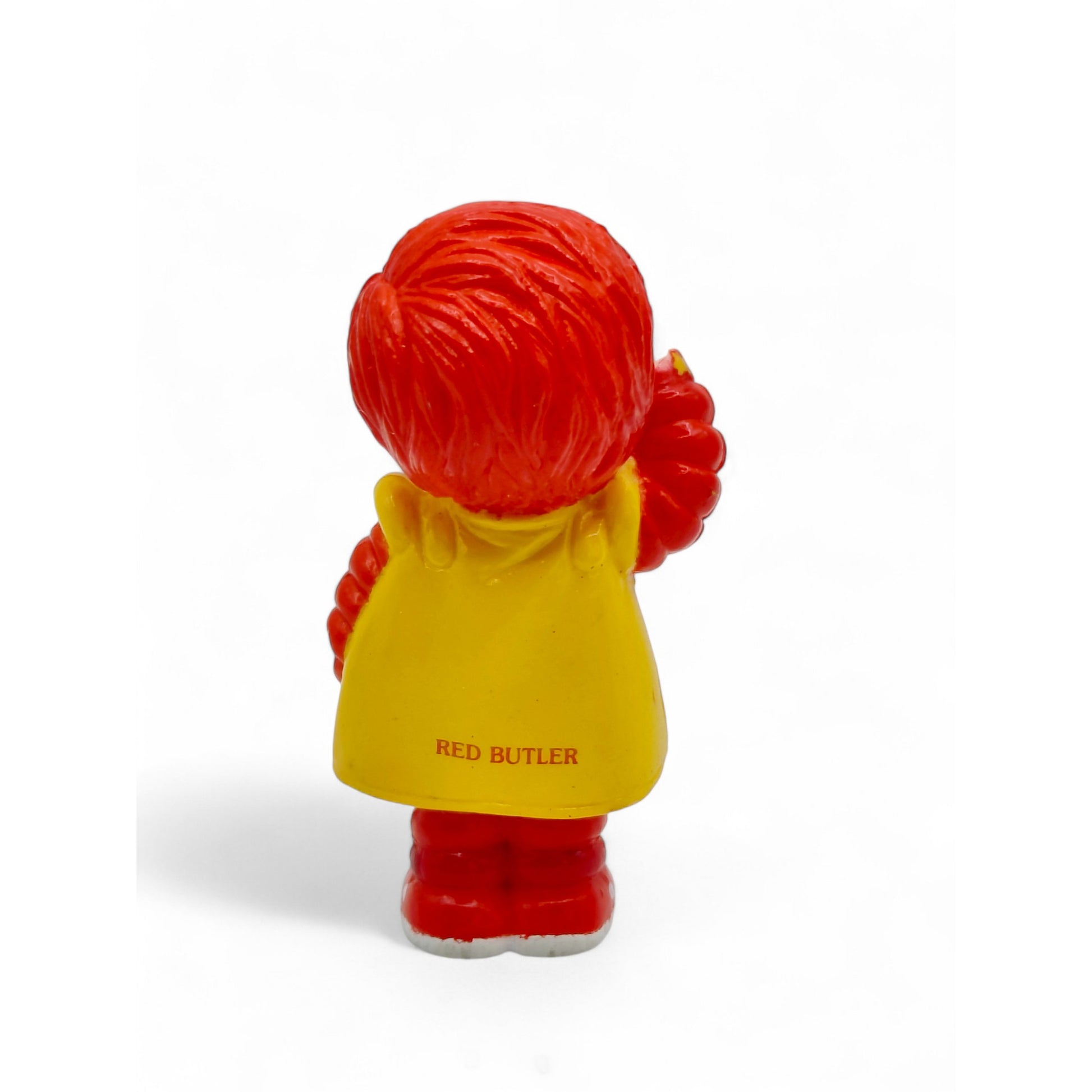 Vintage 1980s mini pvc figure. Mini PVC Figure. Red Butler. 6cm. Back view.
