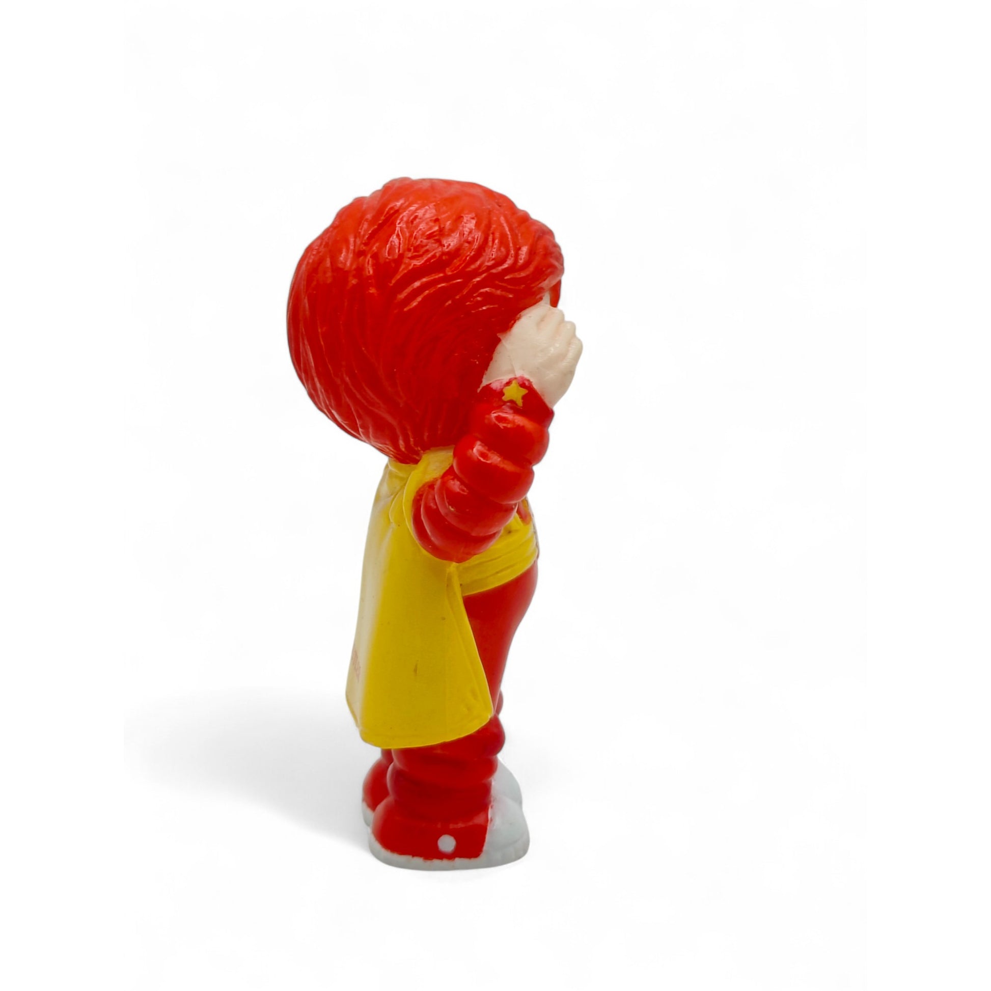 Vintage 1980s mini pvc figure. Mini PVC Figure. Red Butler. 6cm. Right view.