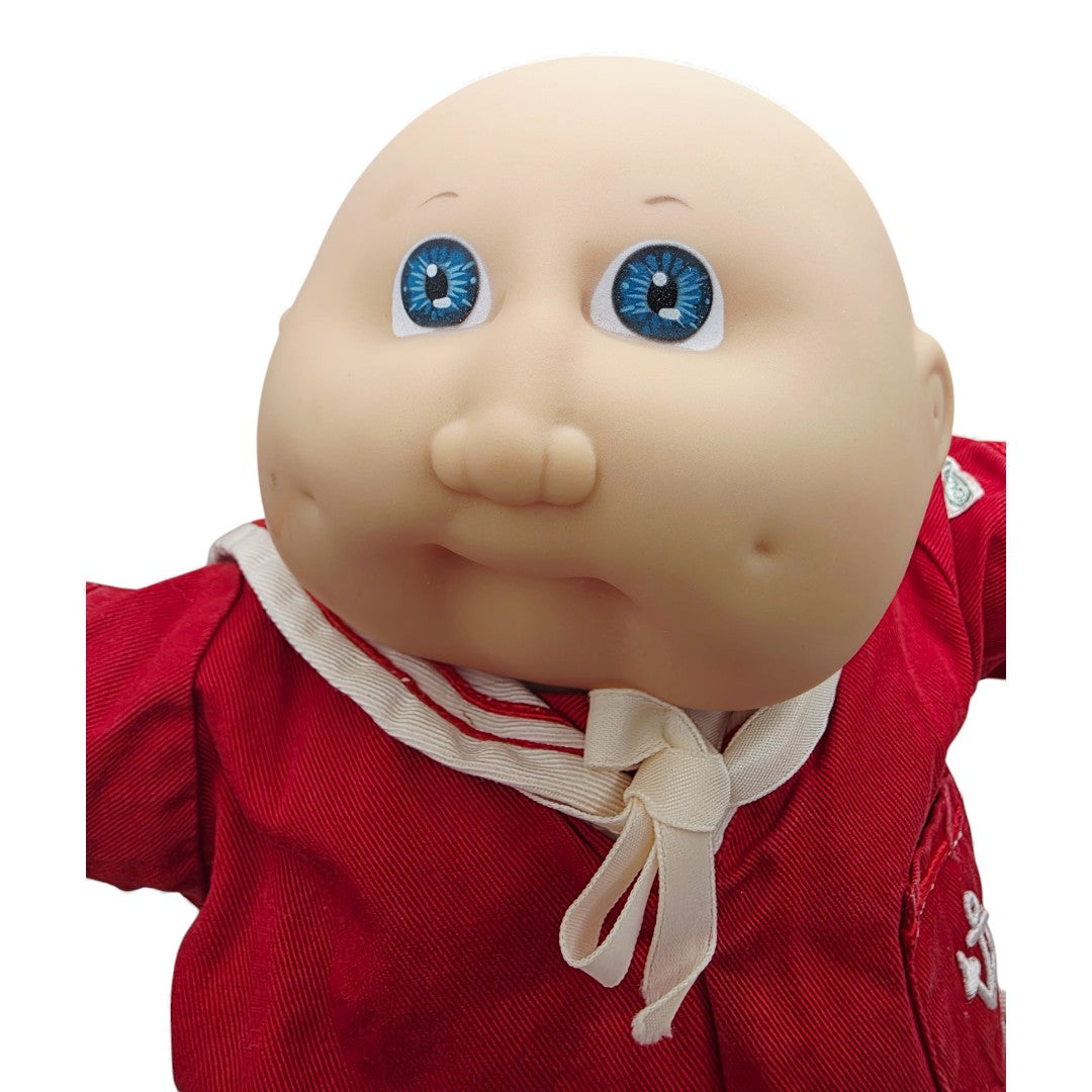 Vintage 1980s doll. Boy in a Sailor Suit. Face view.