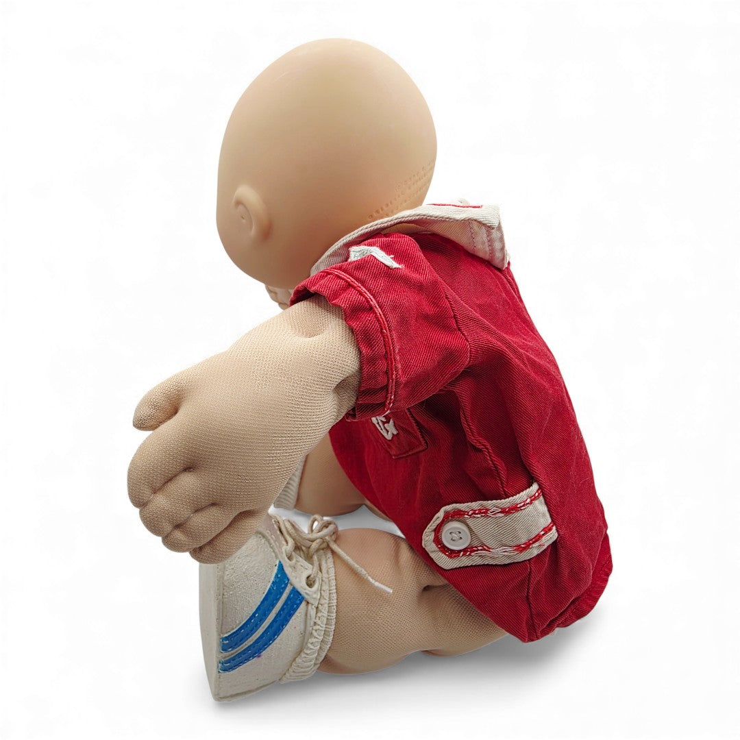 Vintage 1980s doll. Boy in a Sailor Suit. Left view.