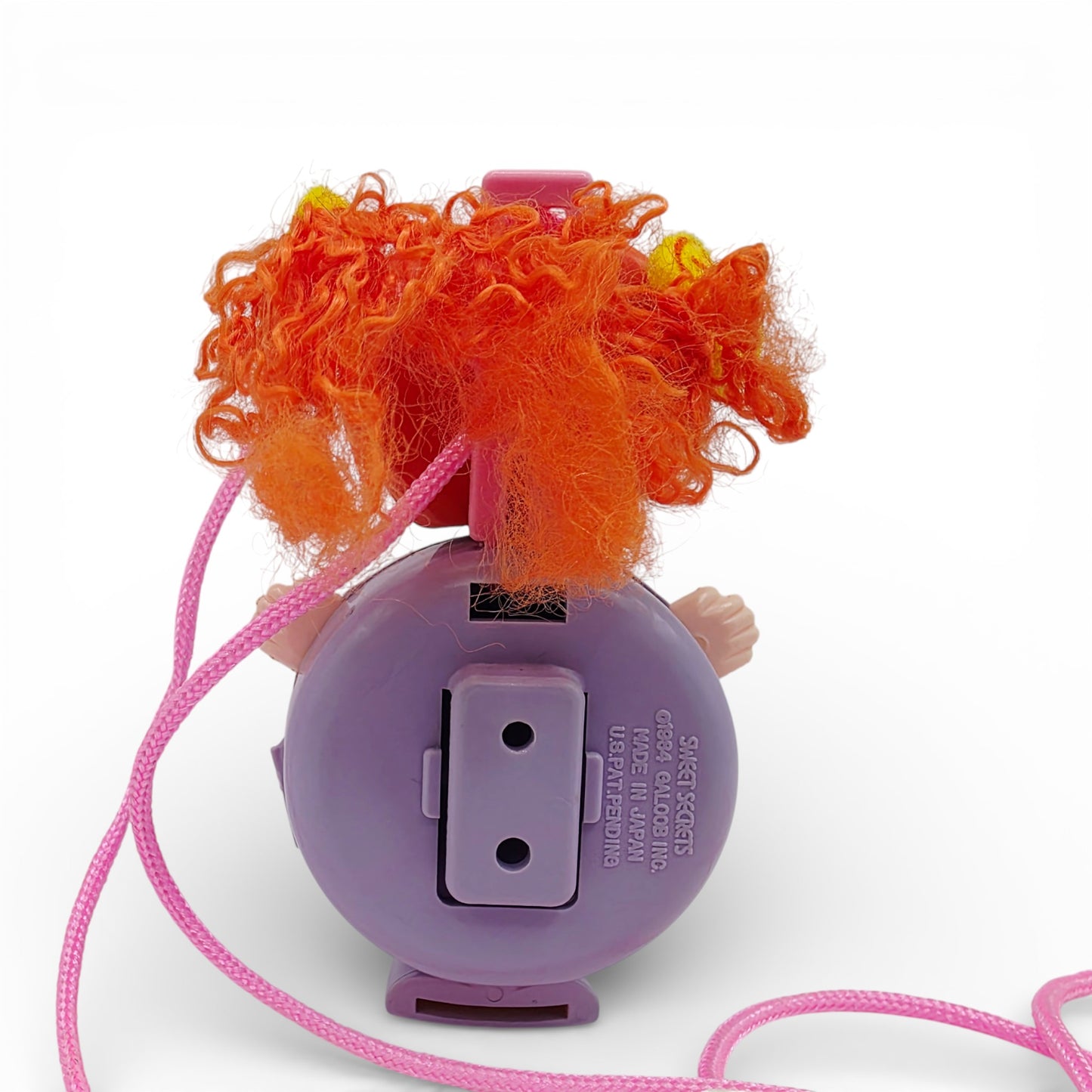 Vintage 1980s small toy. Series 1. Gleamie. Complete with Necklace Clip!. Back view.