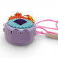 Vintage 1980s small toy. Series 1. Gleamie. Complete with Necklace Clip!. Bottom view.