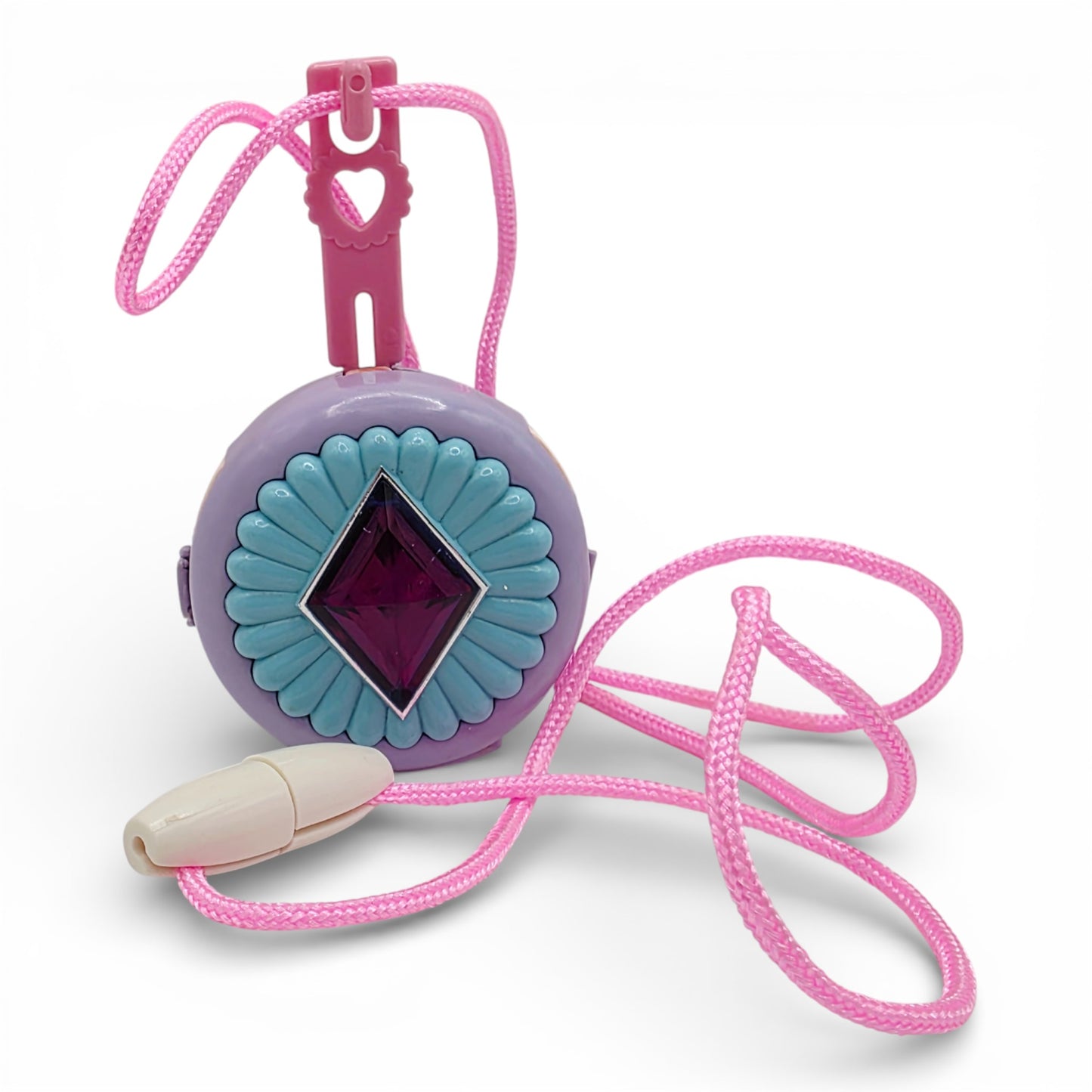 Vintage 1980s small toy. Series 1. Gleamie. Complete with Necklace Clip!. Face view.
