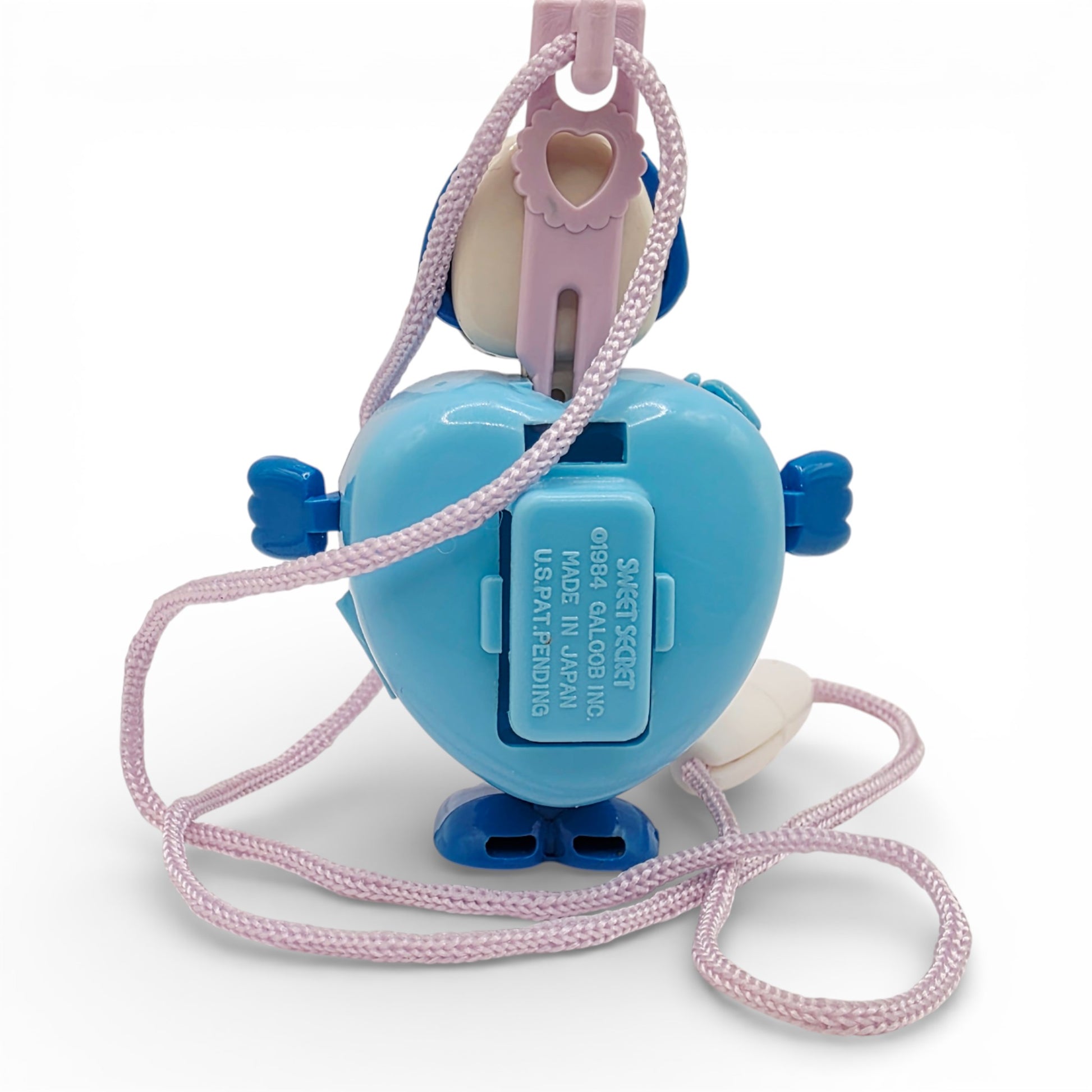 Vintage 1980s small toy. Series 1. Prettie Puppy. Complete with Necklace Clip!. Back view.