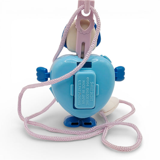 Vintage 1980s small toy. Series 1. Prettie Puppy. Complete with Necklace Clip!. Back view.