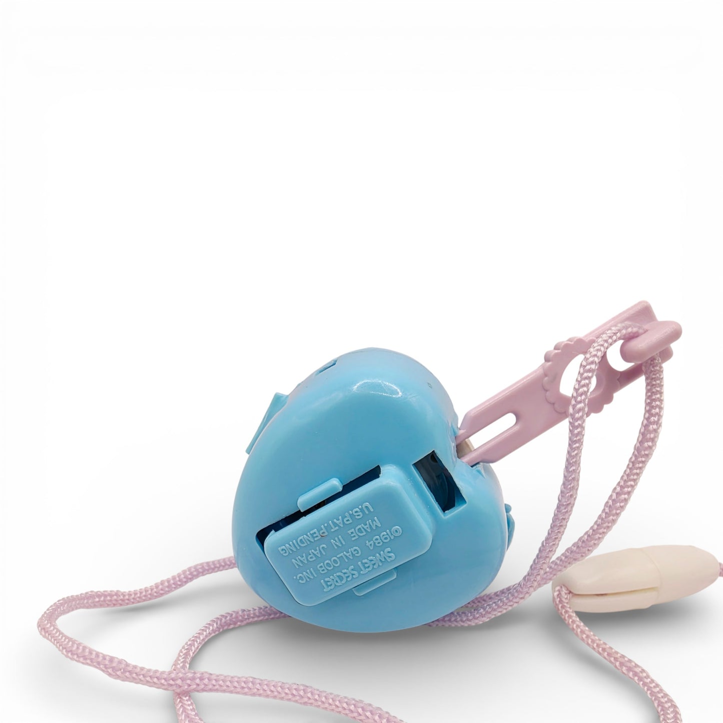 Vintage 1980s small toy. Series 1. Prettie Puppy. Complete with Necklace Clip!. Close up 1 view.