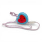 Vintage 1980s small toy. Series 1. Prettie Puppy. Complete with Necklace Clip!. Face view.
