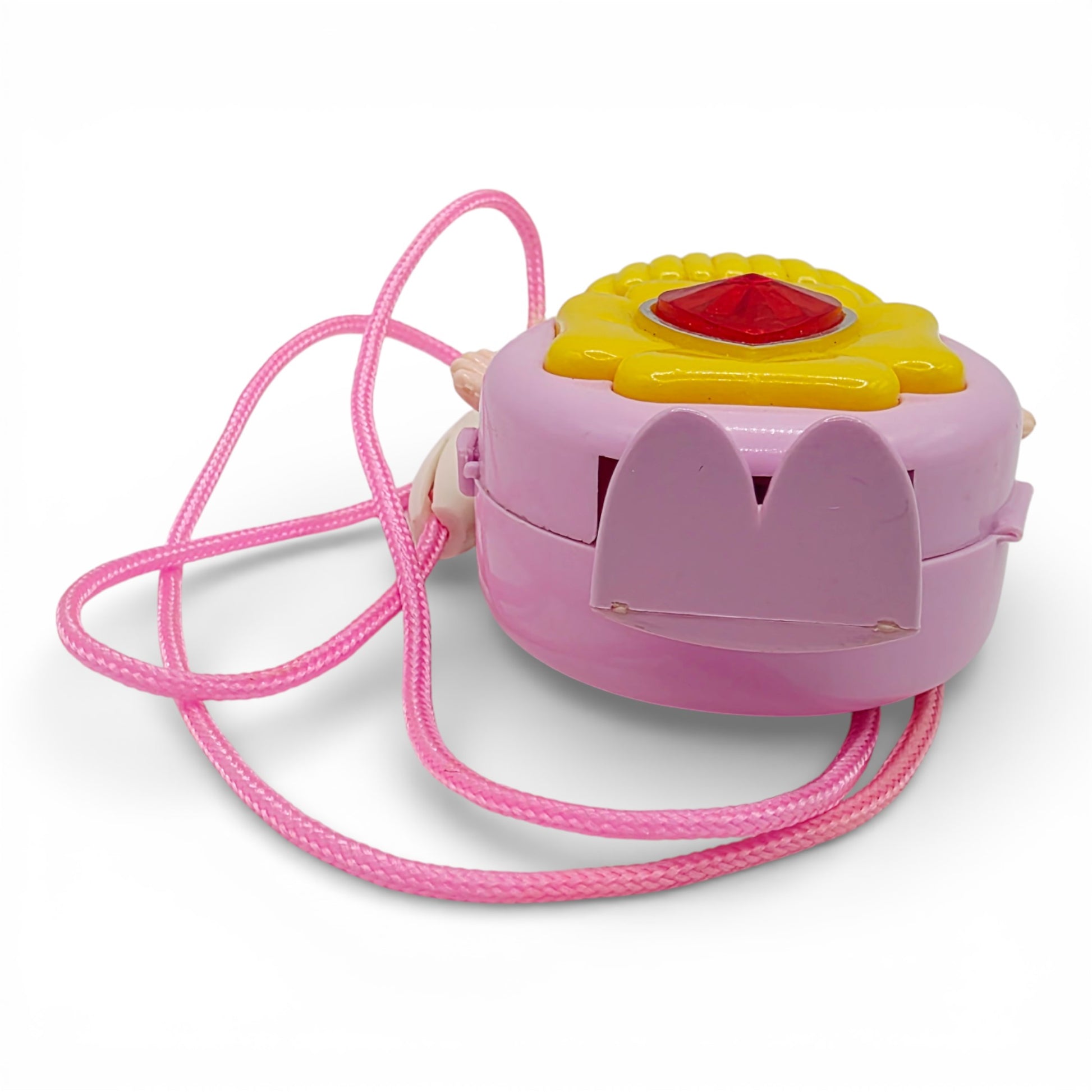 Vintage 1980s small toy. Series 1. Shinie. Comes with Necklace Clip!. Bottom view.