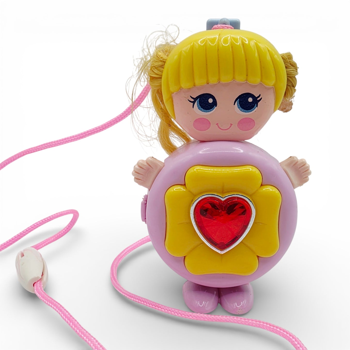 Vintage 1980s small toy. Series 1. Shinie. Comes with Necklace Clip!. Front view.
