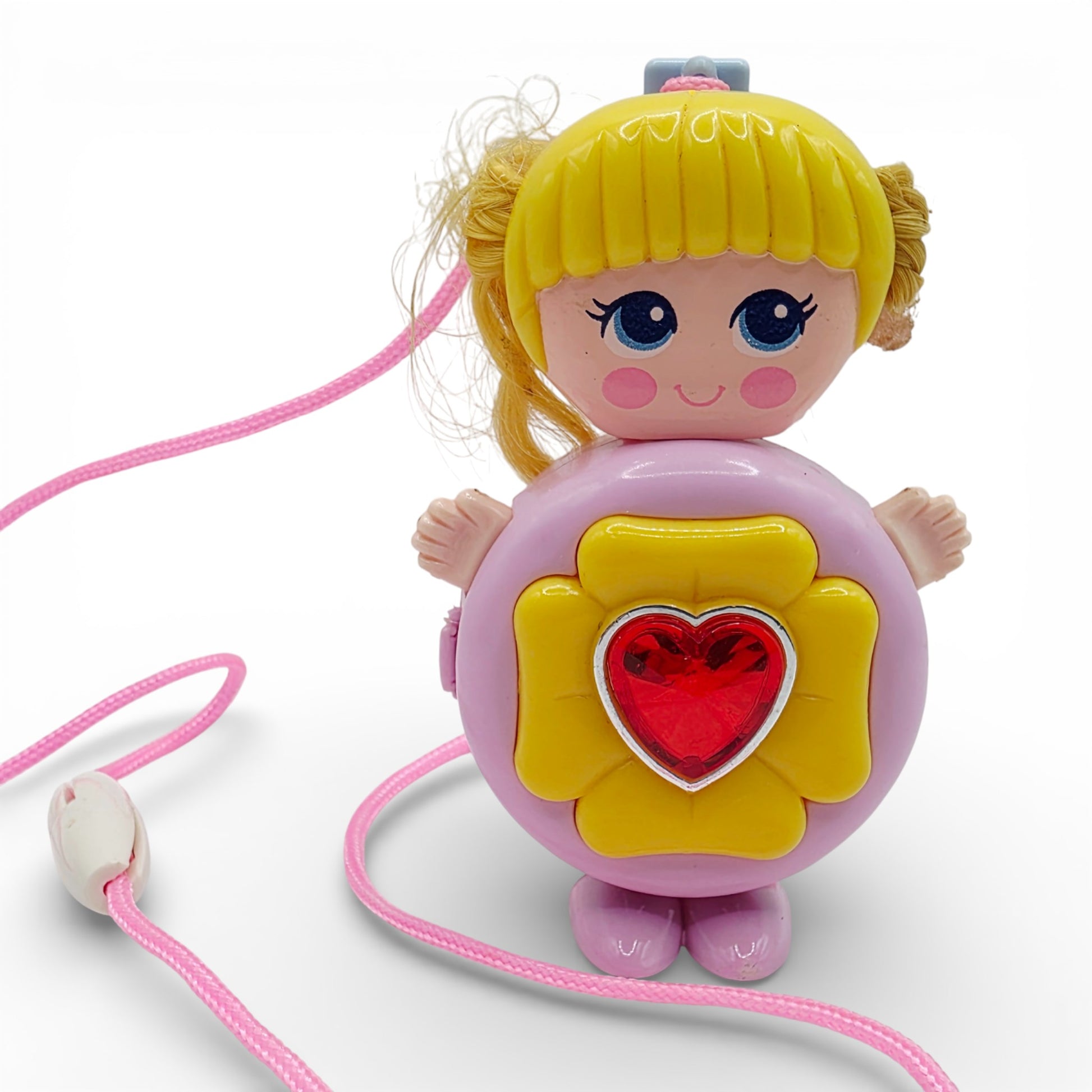 Vintage 1980s small toy. Series 1. Shinie. Comes with Necklace Clip!. Front view.