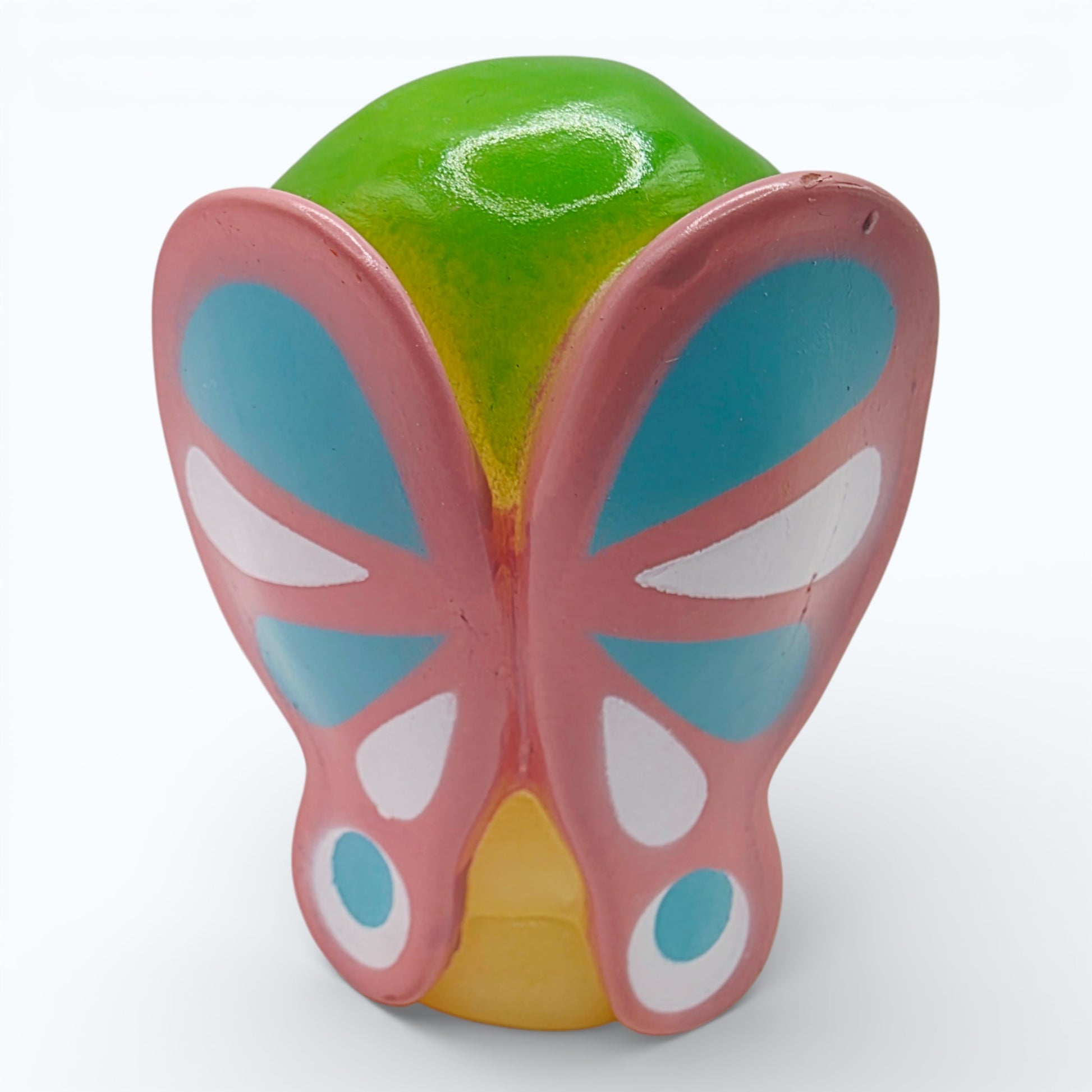 Vintage 1980s mini pvc figure. Glo Butterfly. 3". Back view.