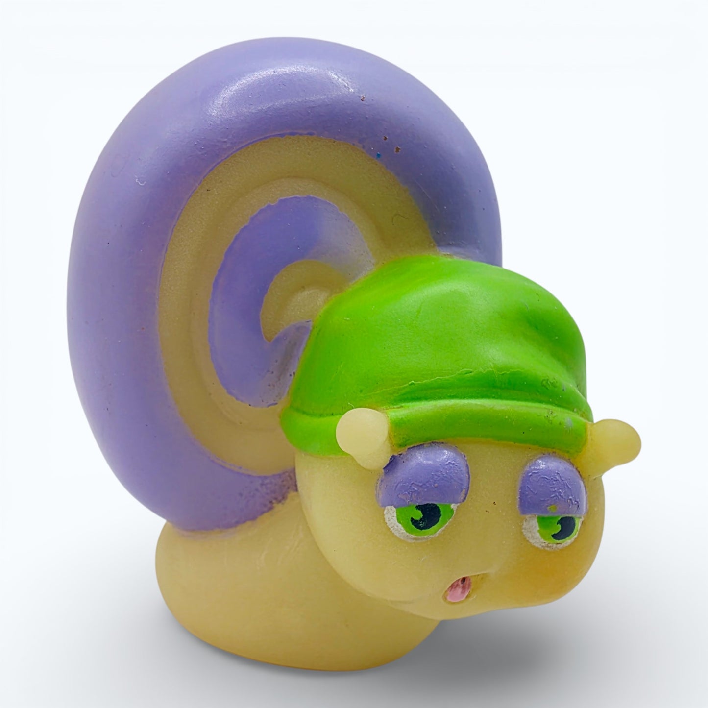 Vintage 1980s mini pvc figure. Glo Snail. 3". Front view.